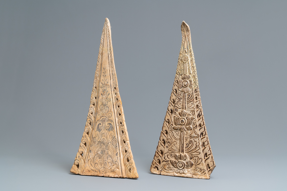 Two large triangular Thai Sawankhalok roof tile finials, 14/16th C.