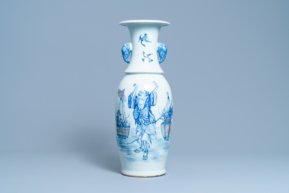 A Chinese blue, white and copper red vase with elephant handles, 19th C.