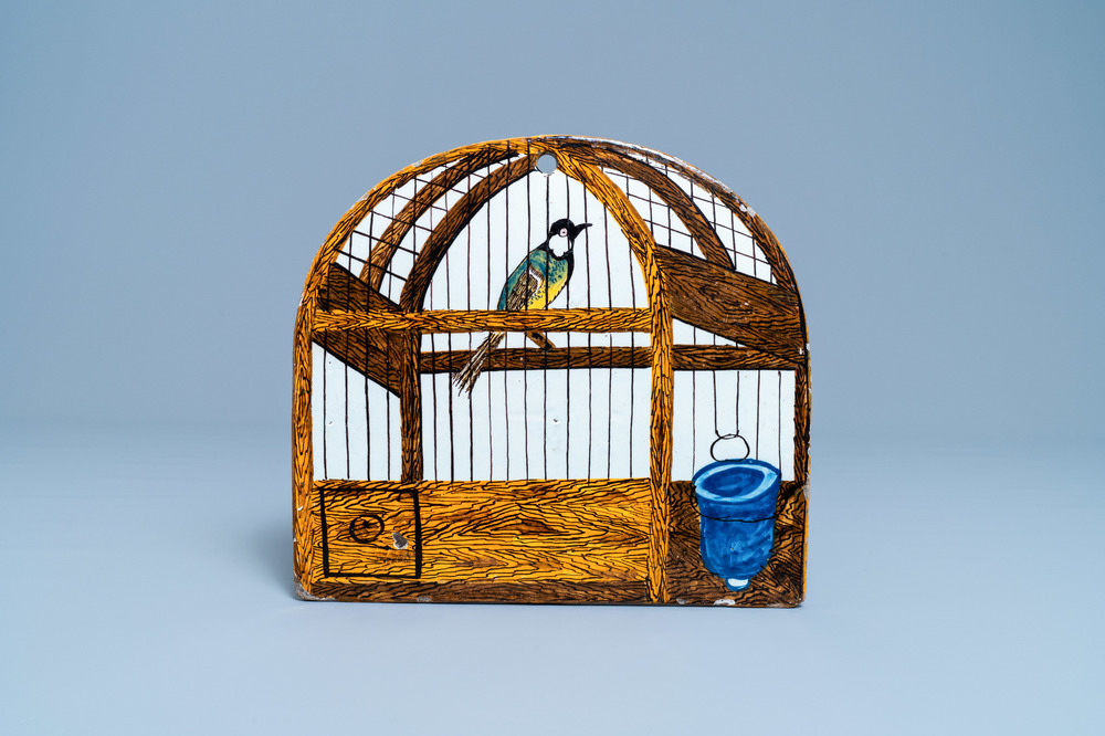 Een polychrome Delftse 'vogelkooi' plaquette, gedateerd 1773