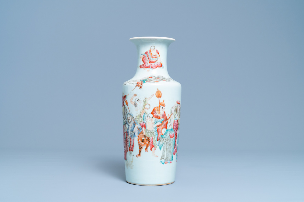 A Chinese famille rose 'luohan and mythical animals' vase, 19/20th C.