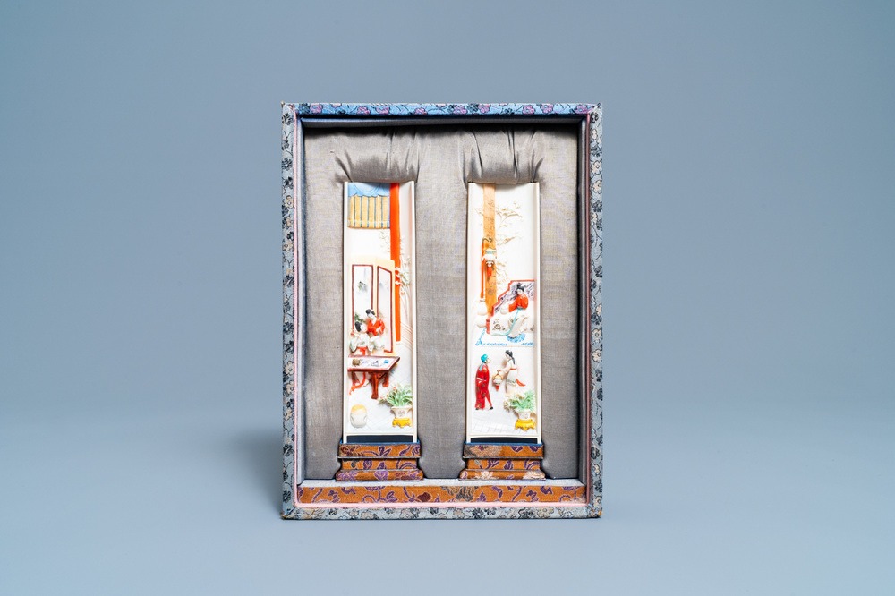 A pair of Chinese polychrome carved wrist rests in presentation box, Republic