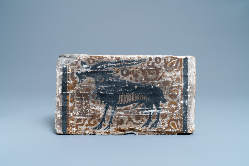 A Spanish pottery socarrat or ceiling tile with a buck, Paterna, 14/15th C.