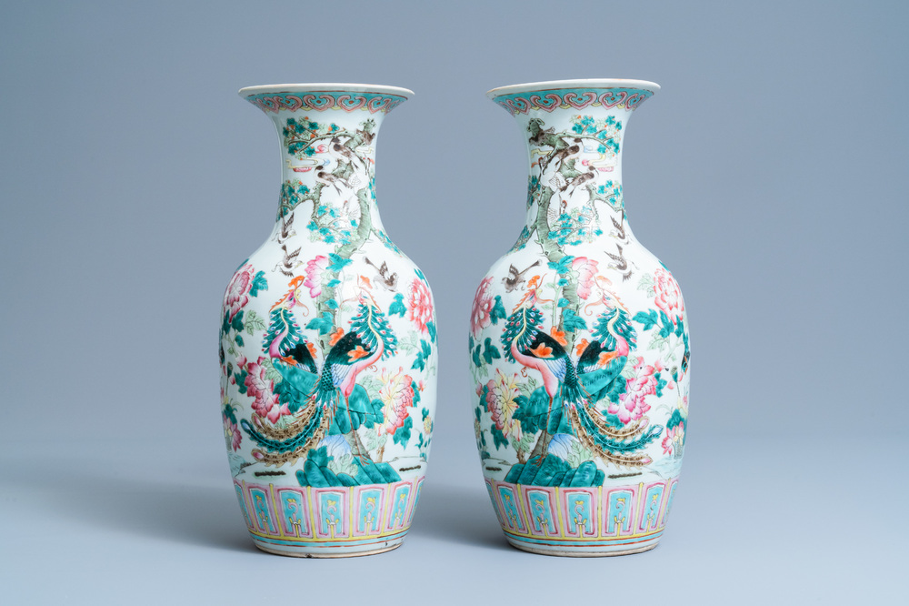 A pair of Chinese famille rose 'phoenix' vases, 19th C.