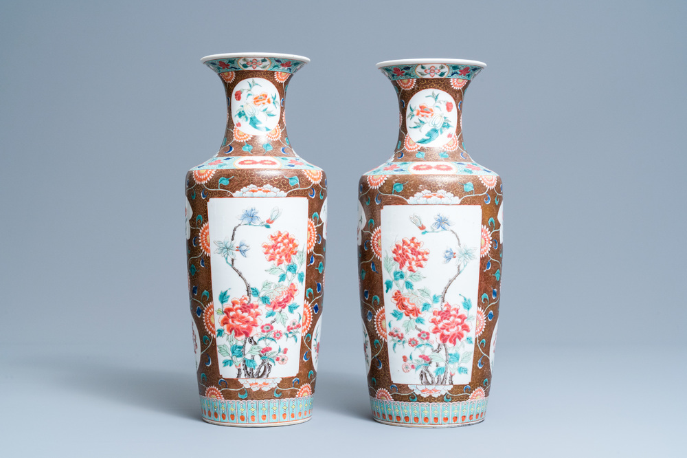 A pair of Chinese famille rose rouleau vases, 19th C.