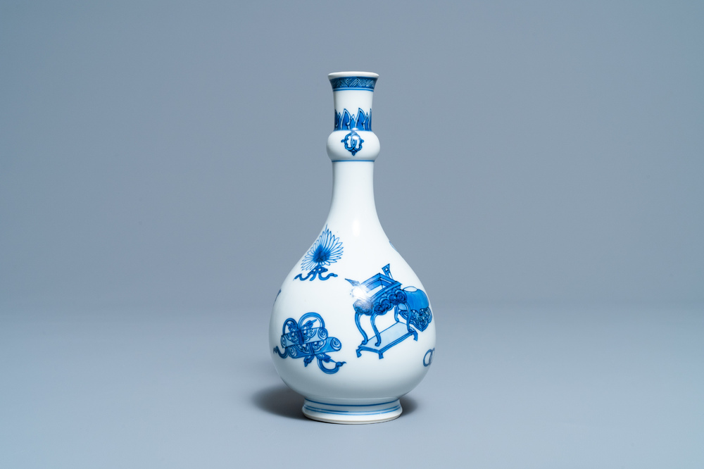 A Chinese blue and white 'antiquities' bottle vase, Kangxi