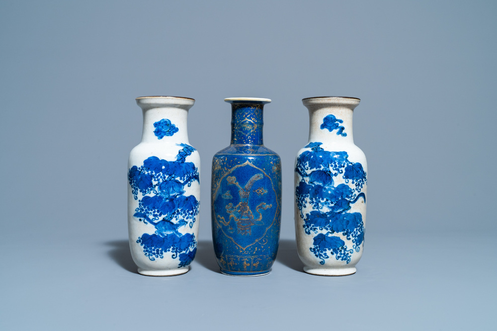 A pair of Chinese blue and white crackle-glazed rouleau vases and a gilt-decorated powder blue vase, 19th C.