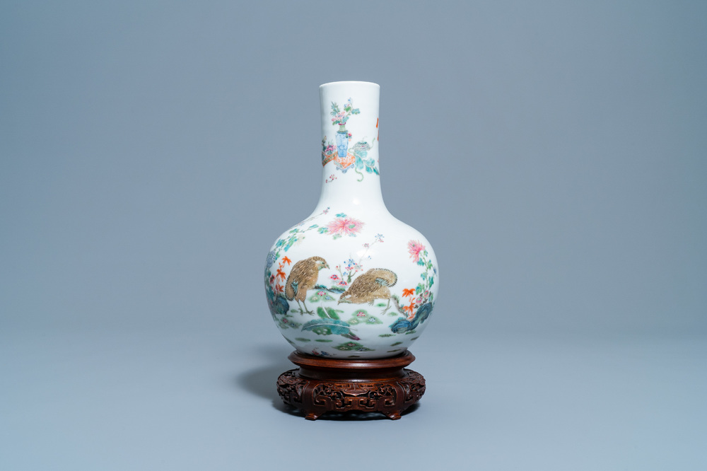 A Chinese famille rose bottle vase with quails, Qianlong mark, 19th C.