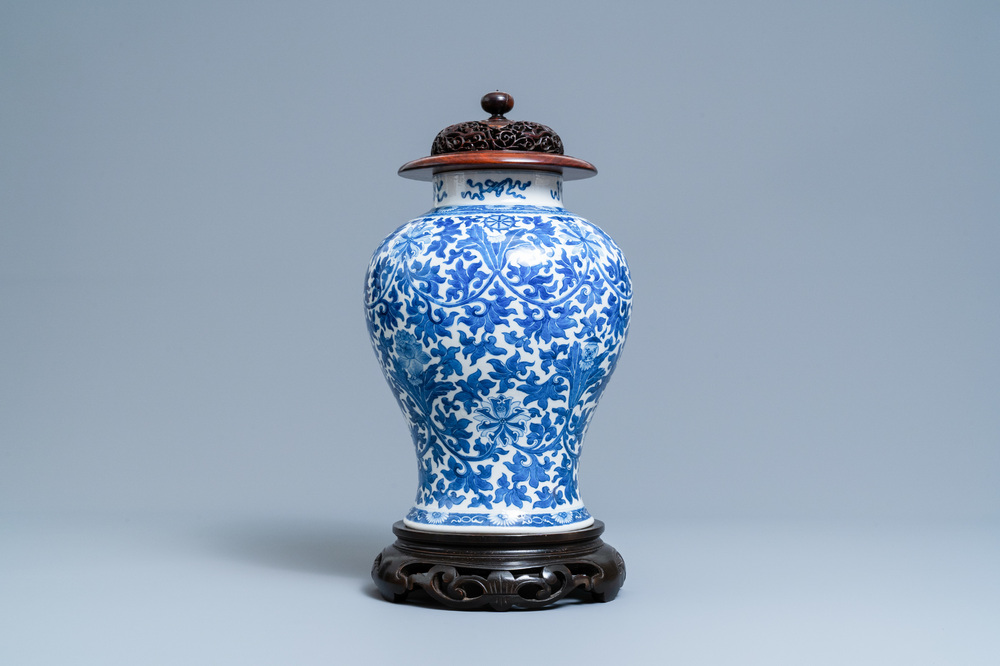 A Chinese blue and white 'lotus scroll' vase, 19th C.