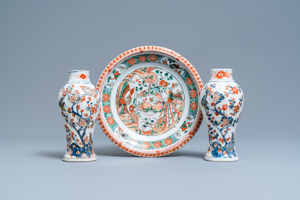 A Chinese famille verte dish and a pair of Imari-style relief-molded vases, Kangxi