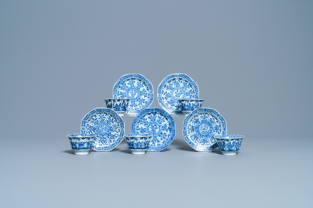 Five Chinese blue and white cups and saucers, Kangxi mark, 19th C.