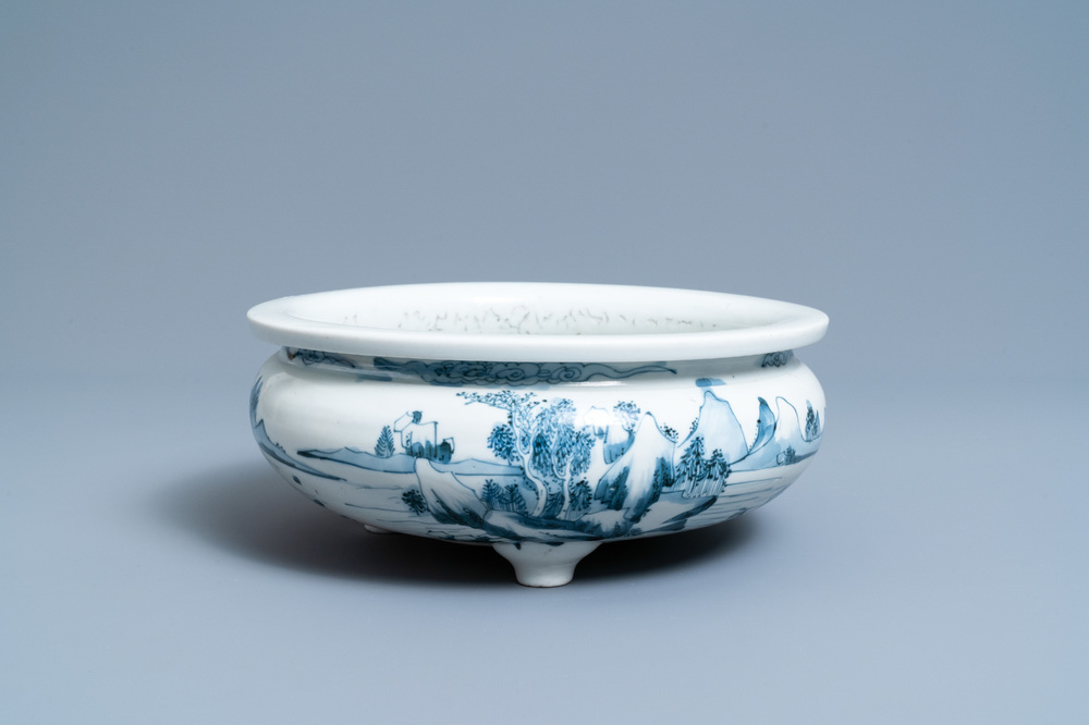 A Chinese blue and white tripod censer with a landscape, Dehua, Kangxi
