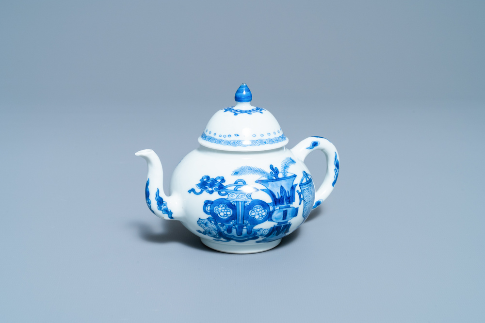 A Chinese blue and white teapot and cover with antiquities, Jiajing mark, Kangxi