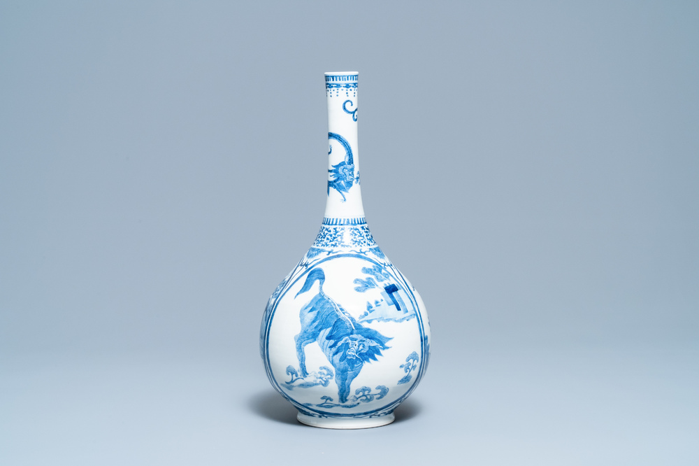 A Chinese blue and white 'qilin' bottle vase, 19th C.