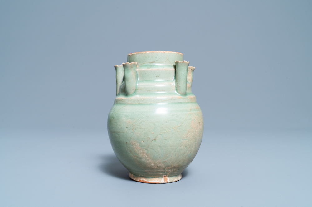 A Chinese Longquan celadon five-spouted urn, Song
