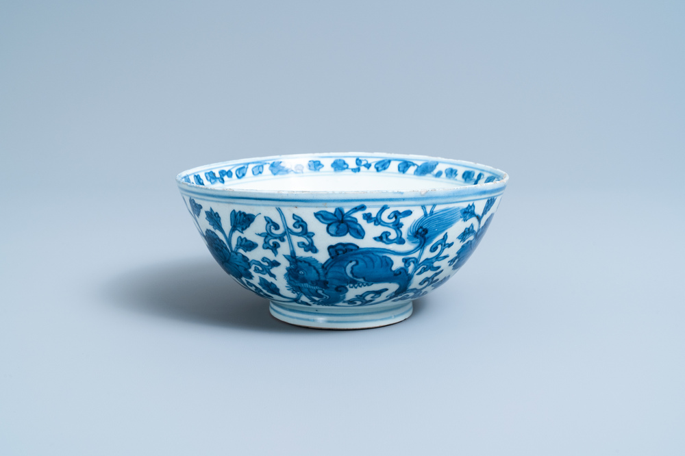 A Chinese blue and white 'Buddhist lion' bowl, Chenghua mark, Jiajing/Wanli