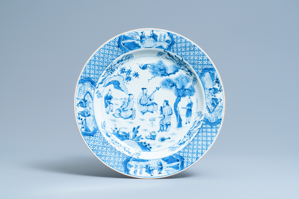 A Chinese blue and white 'musicians' dish, Kangxi