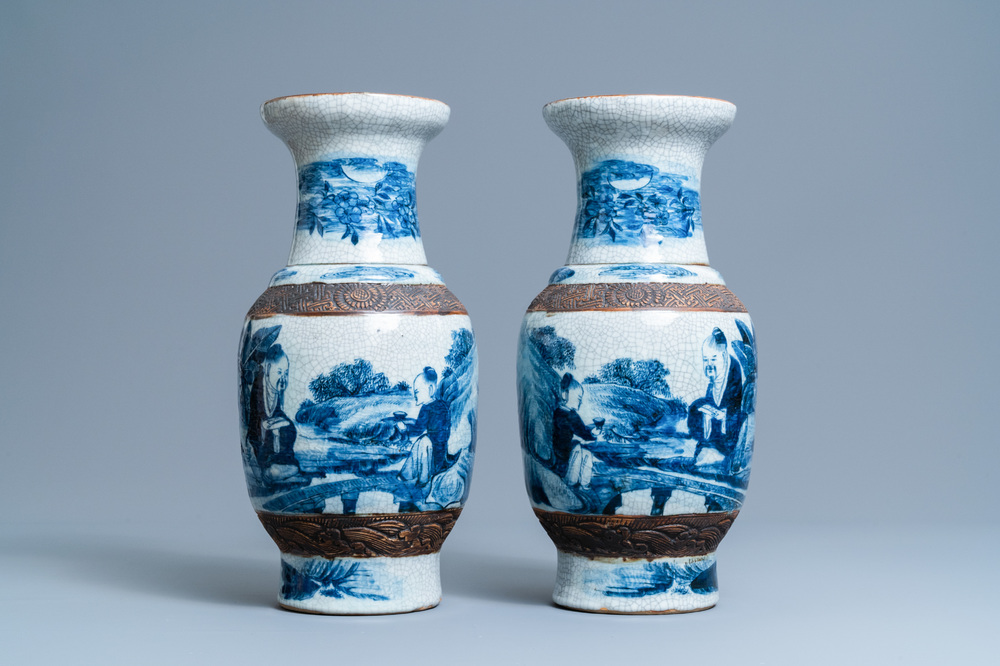 A pair of Chinese blue and white Nanking crackle-glazed vases, 19th C.