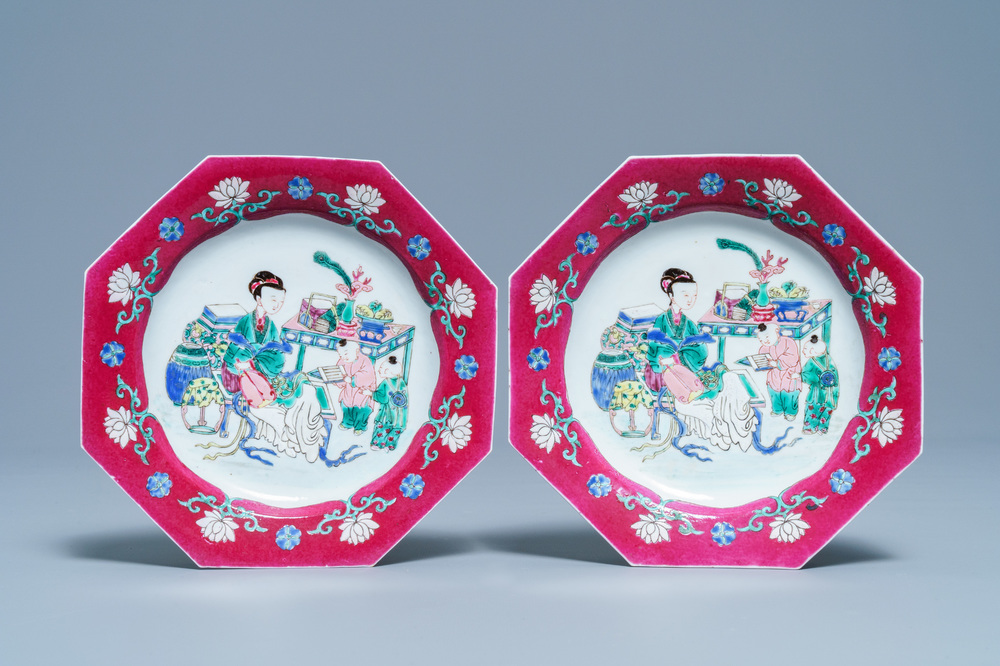 A pair of Chinese octagonal famille rose 'ruby border' plates, Yongzheng