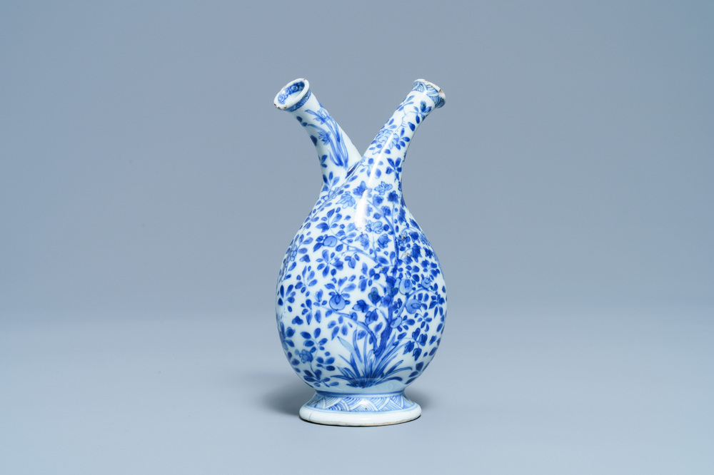 A Chinese blue and white two-spouted oil and vinegar bottle, Kangxi