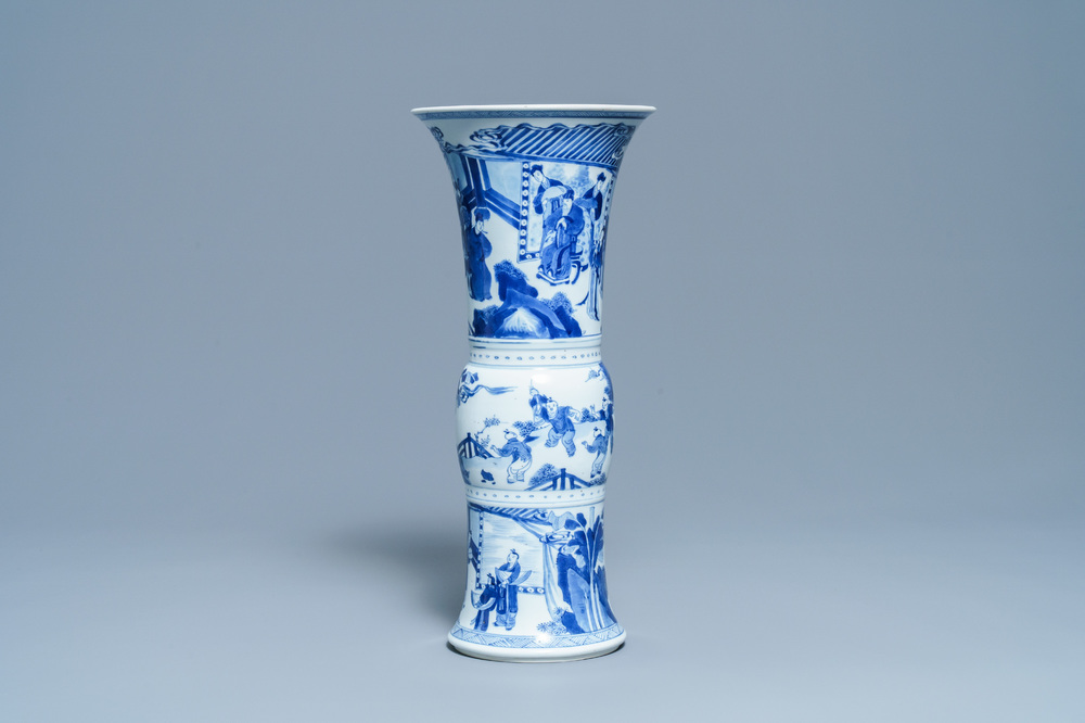 A Chinese blue and white 'gu' vase with figurative design, Kangxi
