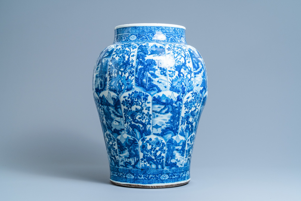 A massive Chinese blue and white vase with floral and landscape panels, Kangxi