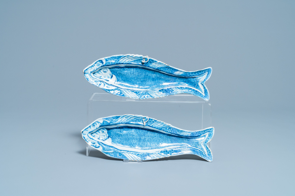 A pair of Dutch Delft blue and white 'herring' dishes, 18th C.