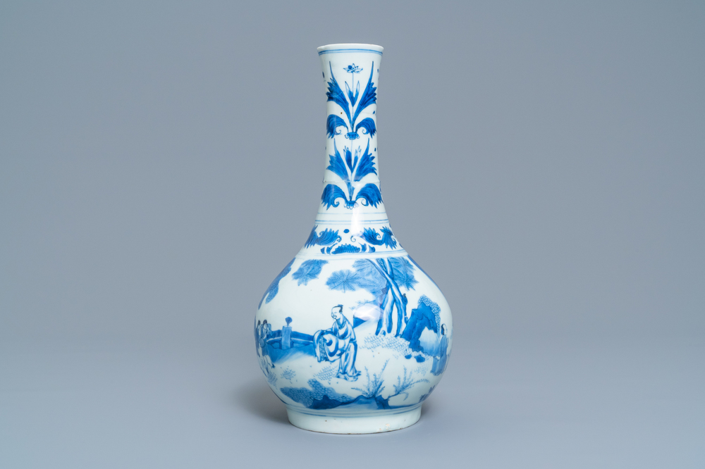 A Chinese blue and white bottle vase with figures in a landscape, Transitional period