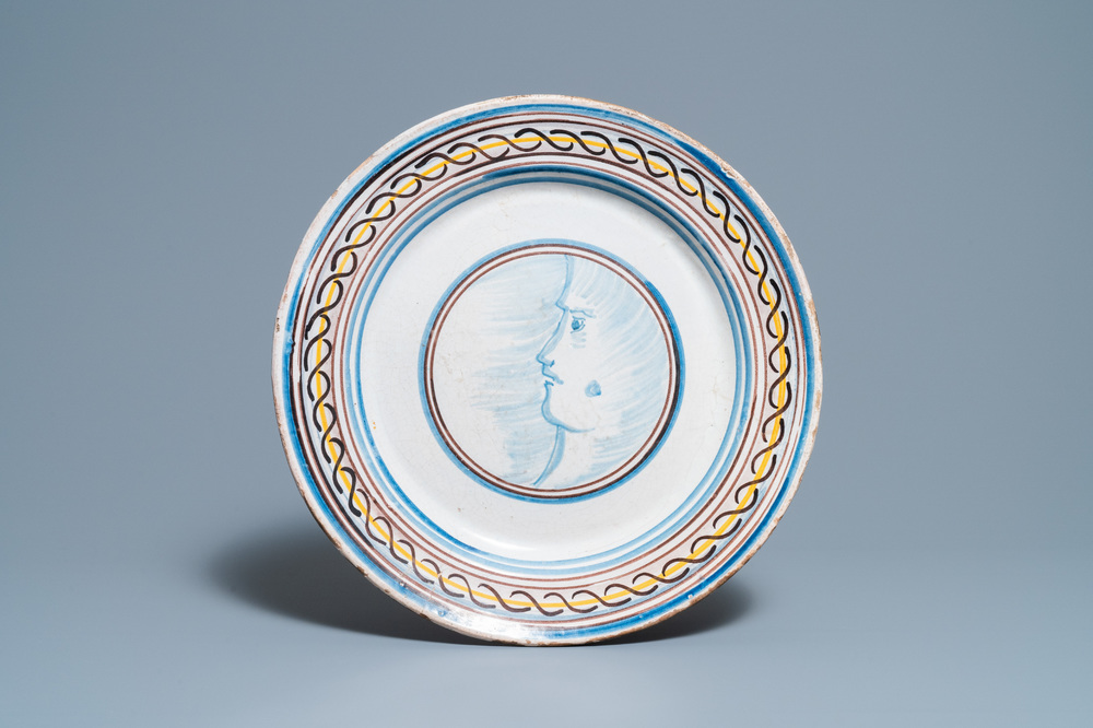 A large polychrome Spanish faience 'portrait' dish, 19th C.
