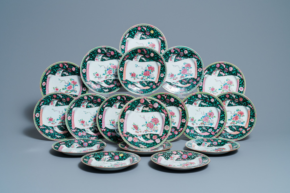 Eighteen Chinese famille rose plates with floral sprigs on scrolls, Yongzheng