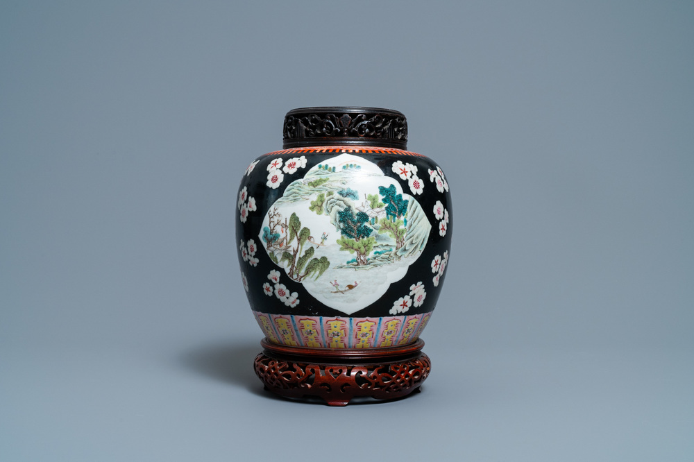A Chinese black-ground famille rose jar, 19th C.