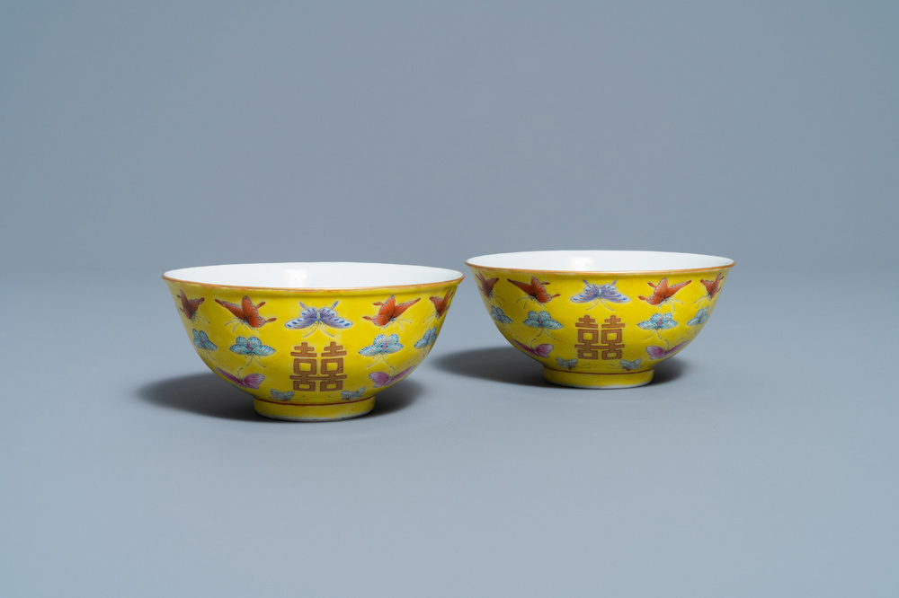 A pair of Chinese famille rose yellow-ground 'butterfly' bowls, Tongzhi mark, 20th C.