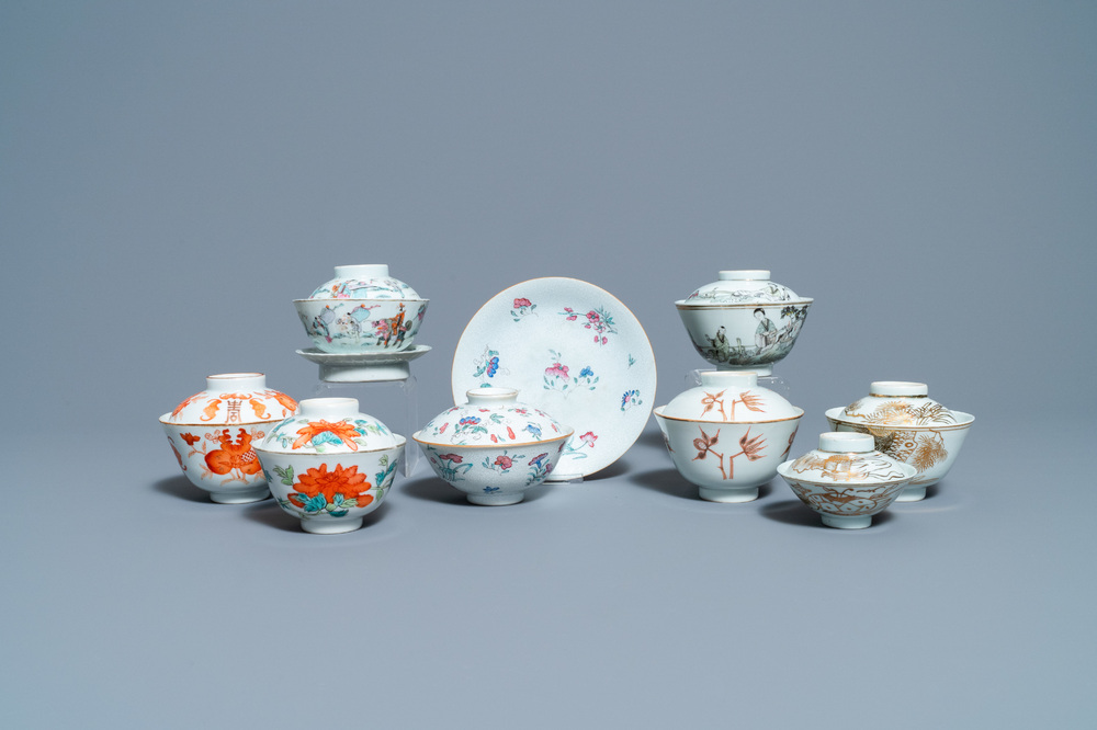 Eight Chinese famille rose and iron-red covered bowls with two stands, 19th C.
