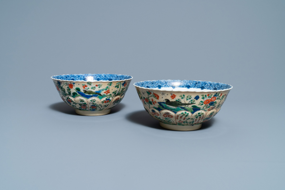 A pair of Chinese famille verte caf&eacute;-au-lait-ground lotus-molded bowls, Kangxi