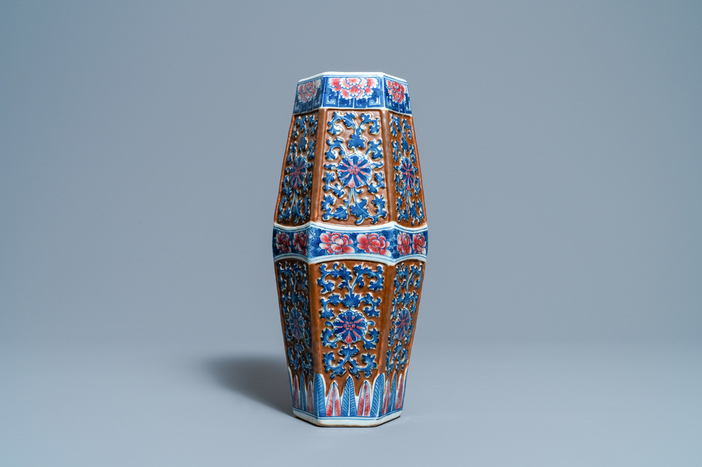 A Chinese hexagonal blue, white and copper-red brown-ground vase, 19th C.