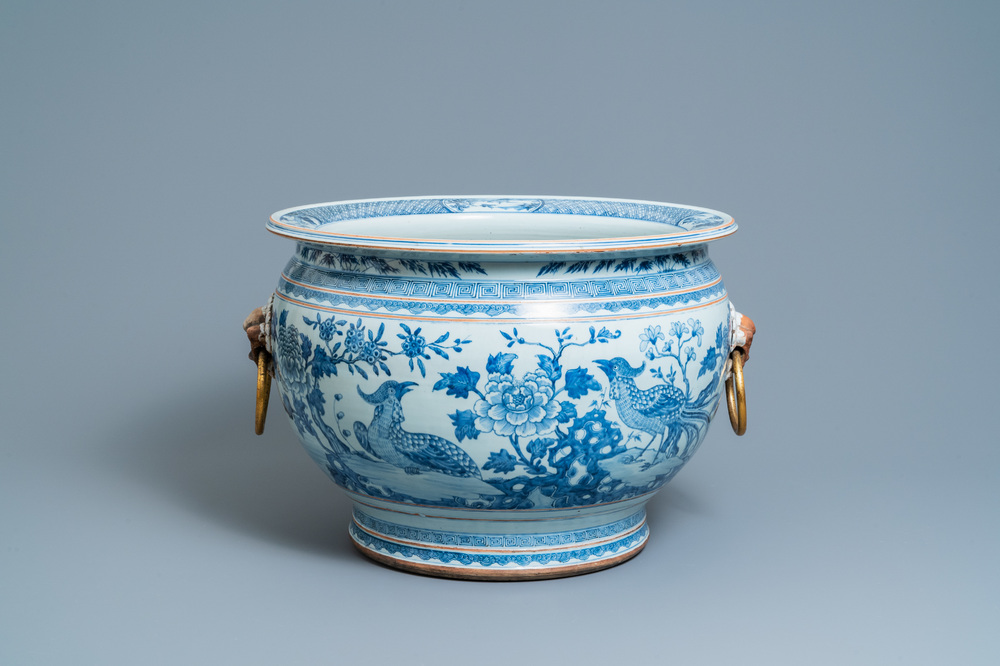 A large Chinese blue and white fishbowl with gilt bronze handles, Qianlong