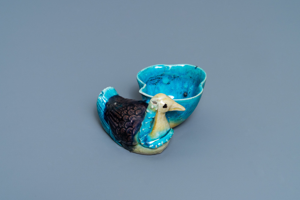 A Chinese aubergine- and turquoise-glazed duck and lotus-shaped water dropper, Kangxi