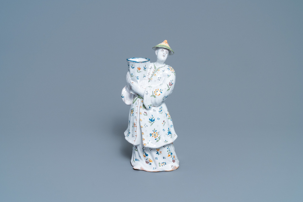 Un bougeoir en forme de chinois en fa&iuml;ence de Lille polychrome, France, 18&egrave;me