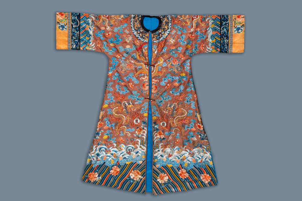 A Chinese embroidered silk brown-ground 'dragon' robe, 18/19th C.