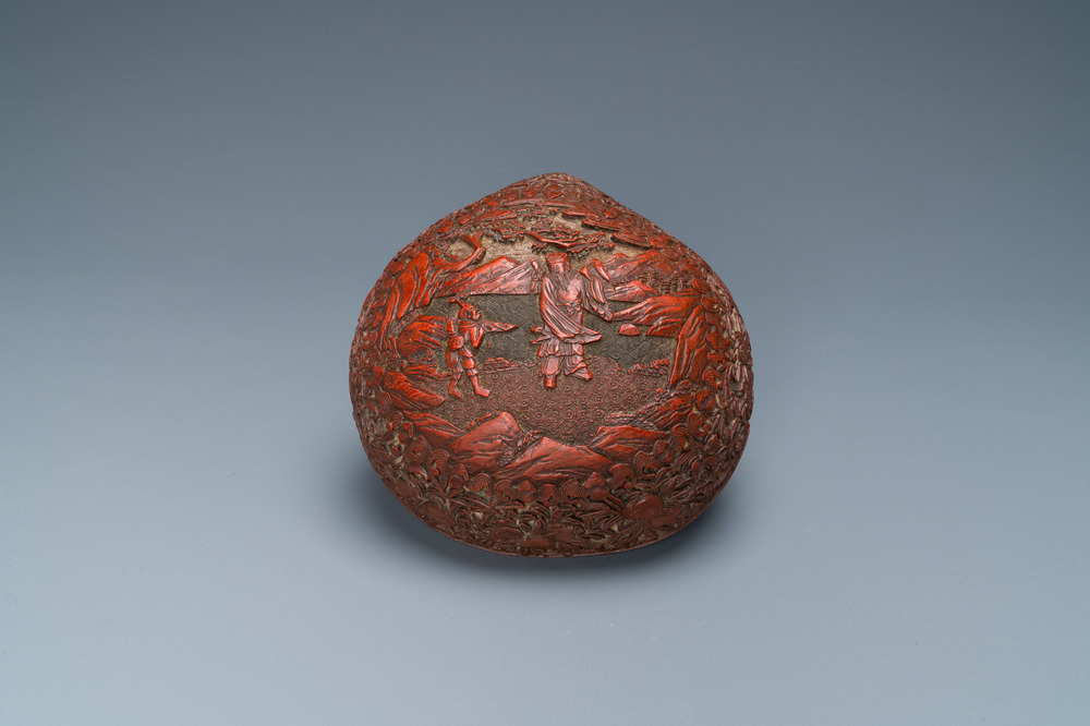 A Chinese red cinnabar lacquer peach-shaped box and cover, Kangxi