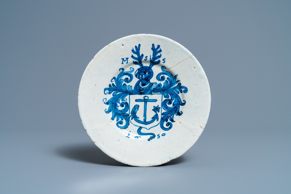 A blue and white Portuguese armorial plate, dated 1650