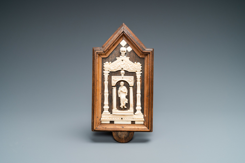 An ivory Madonna retable in wooden frame, 17/18th C.