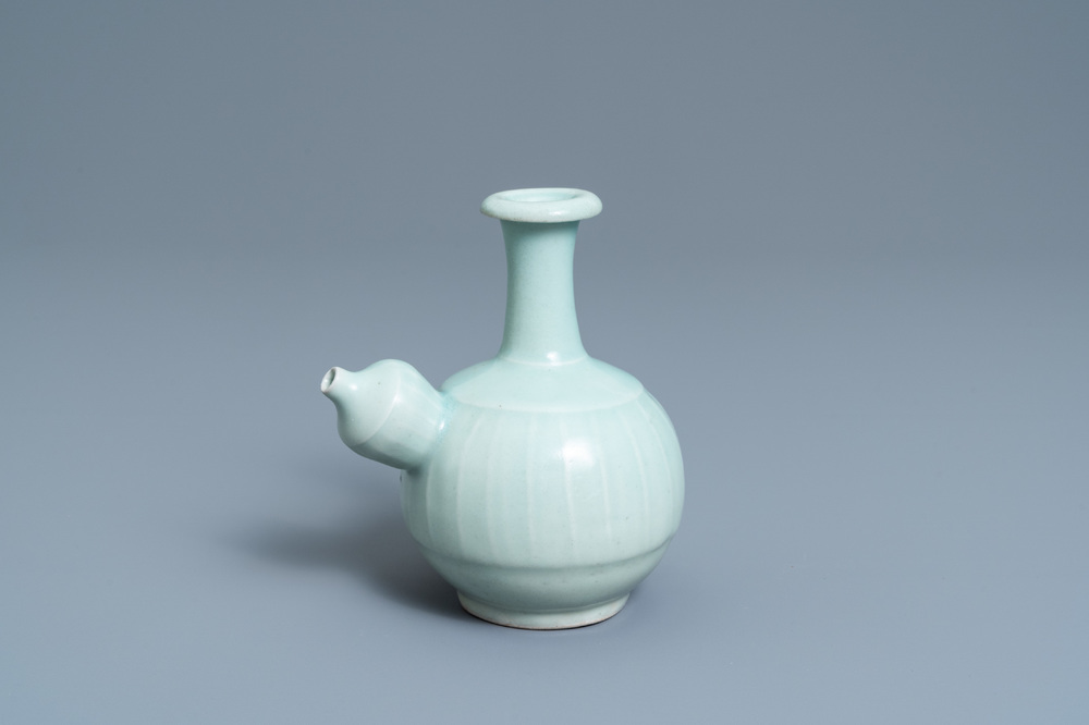 A Chinese monochrome celadon-glazed kendi, 19th C.