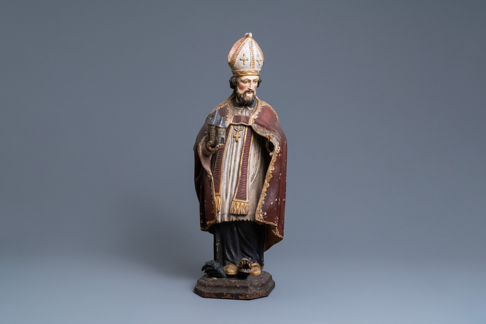 Une grande statue de Saint Amand en bois sculpt&eacute; et polychrom&eacute;, 17&egrave;me