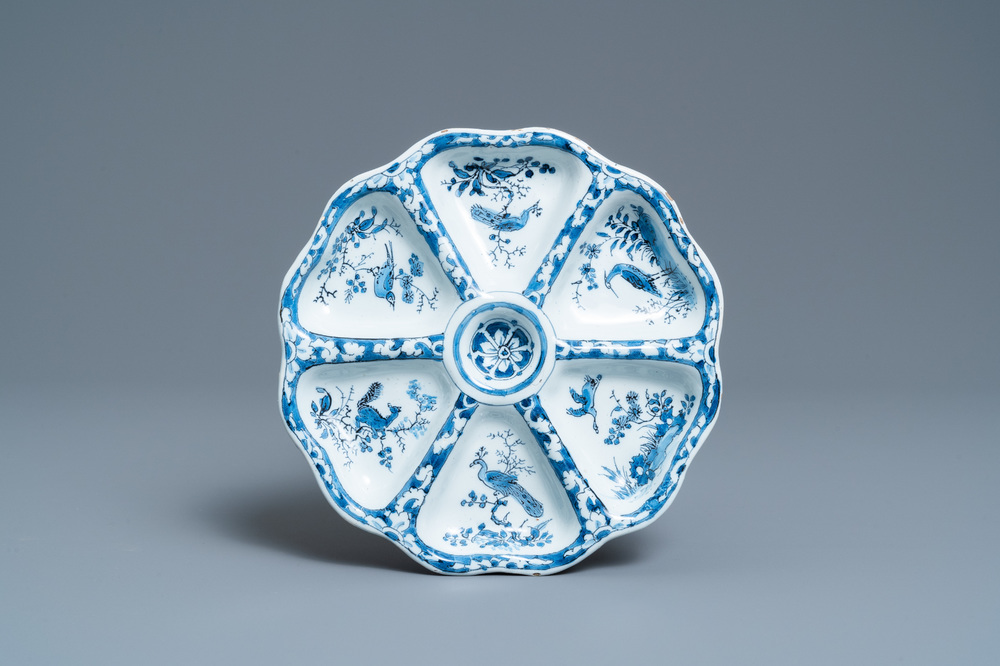 A lobed Dutch Delft blue and white spice dish with birds, late 17th C.