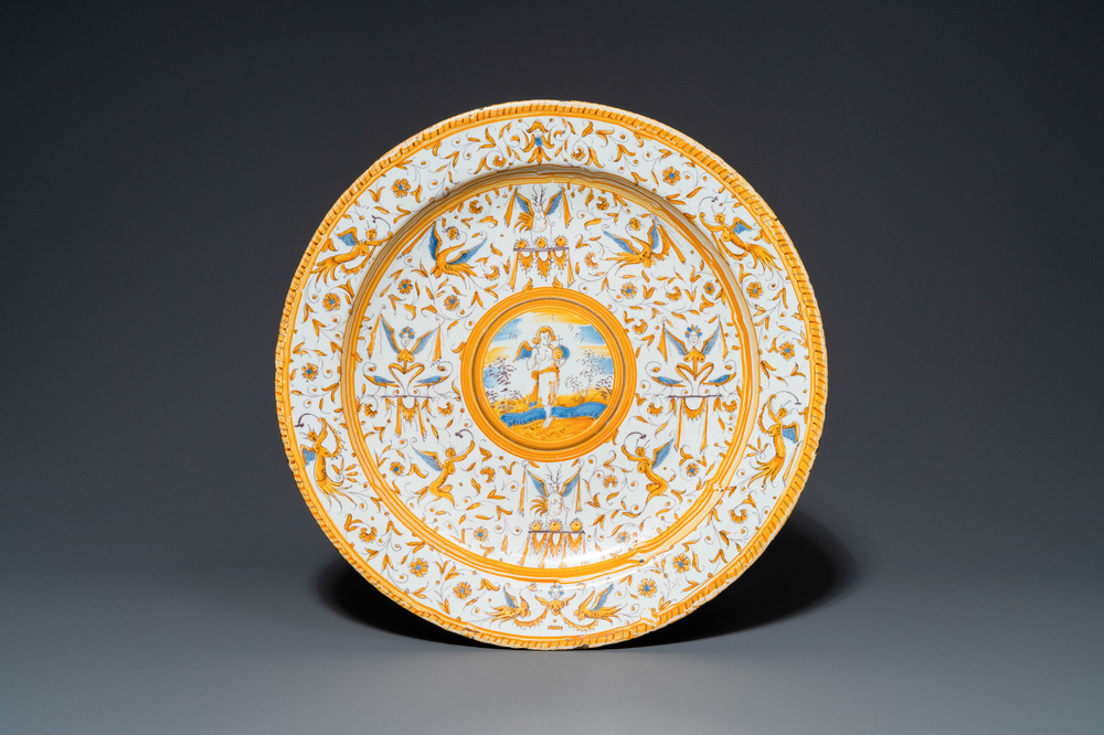 A polychrome 'grotesque' dish with a putto holding an orb, Willem Jansz. Verstraeten, Haarlem, 1645-1655