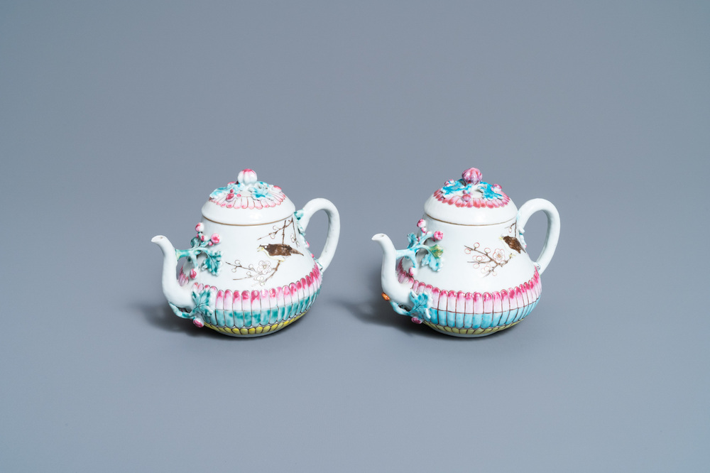 A pair of Chinese famille rose teapots and covers with applied design, Yongzheng