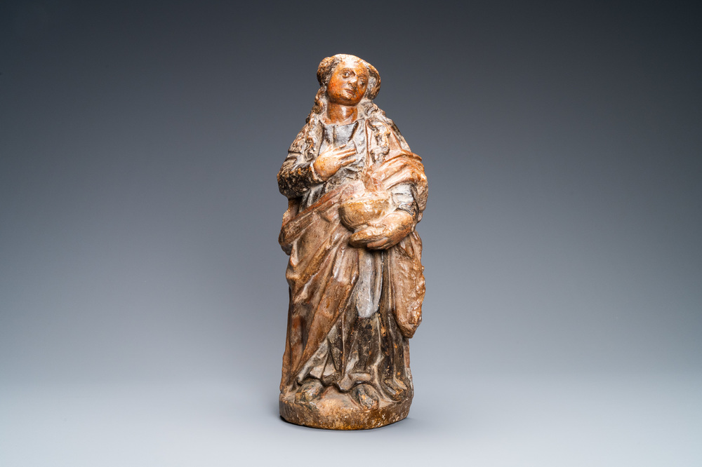 A polychromed sandstone figure of Saint-Lucia, France, 1st half 16th C.