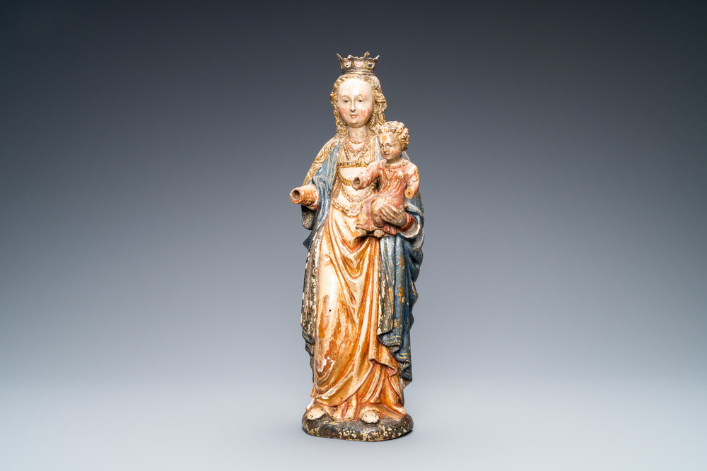 A polychromed and gilded walnut figure of a Madonna with child, so called 'Poup&eacute;e de Malines', 1st half 16th. C.