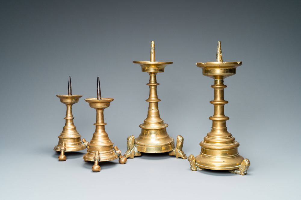 Four bronze candlesticks, Flanders or Germany, 15/16th C.