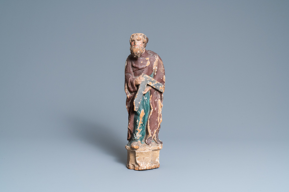 A polychromed oak figure of Saint Thomas on an armorial base, Normandy, France, ca. 1510